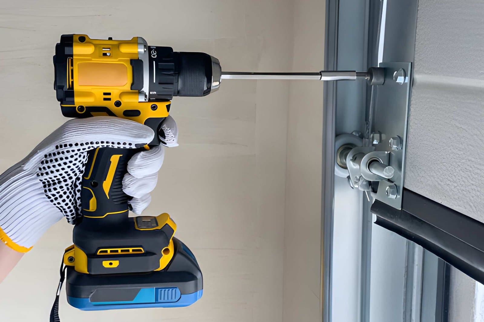 Technician repairing garage door in Melbourne